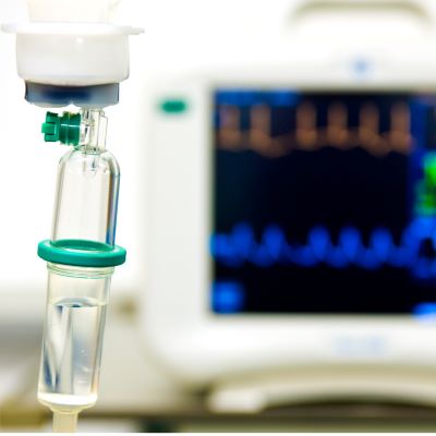 Image of test tube and vitals monitor